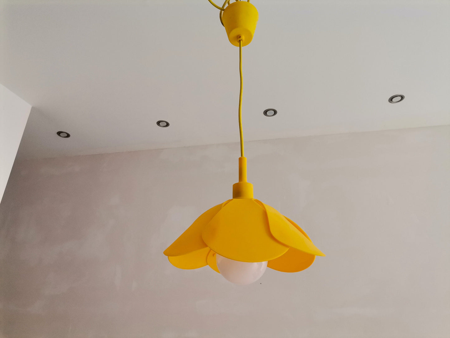 Yellow flower hanging light fixture