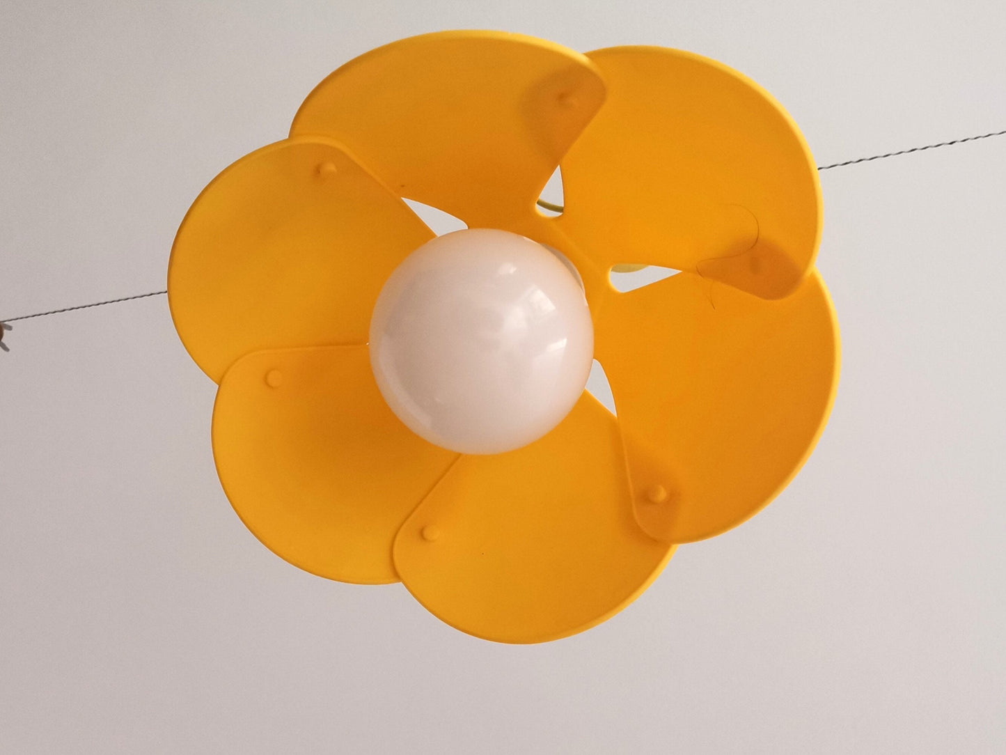 Yellow flower hanging light fixture