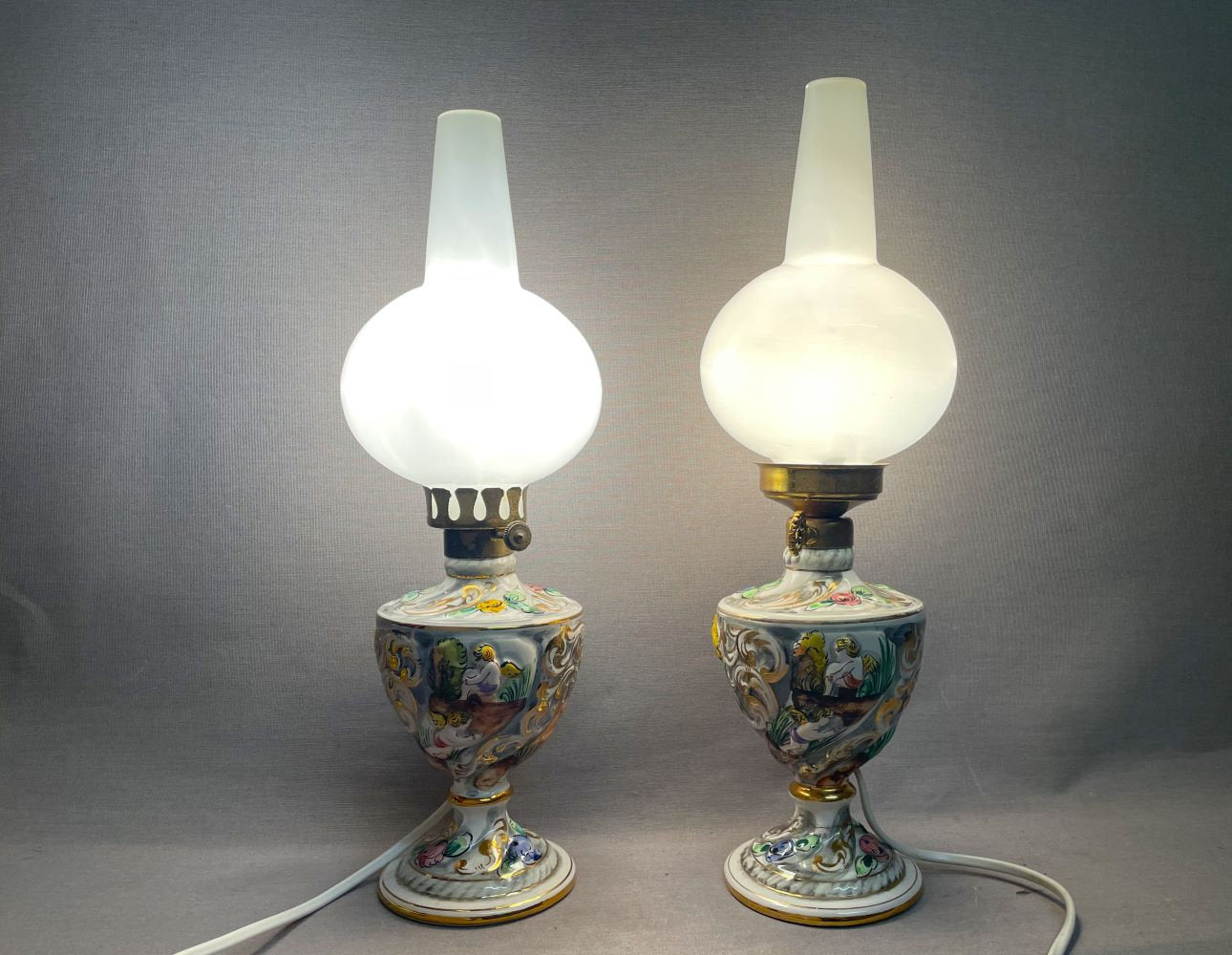 Pair of Portuguese collectible hand painted porcelain table lamps by Alcobaça NUMBERED