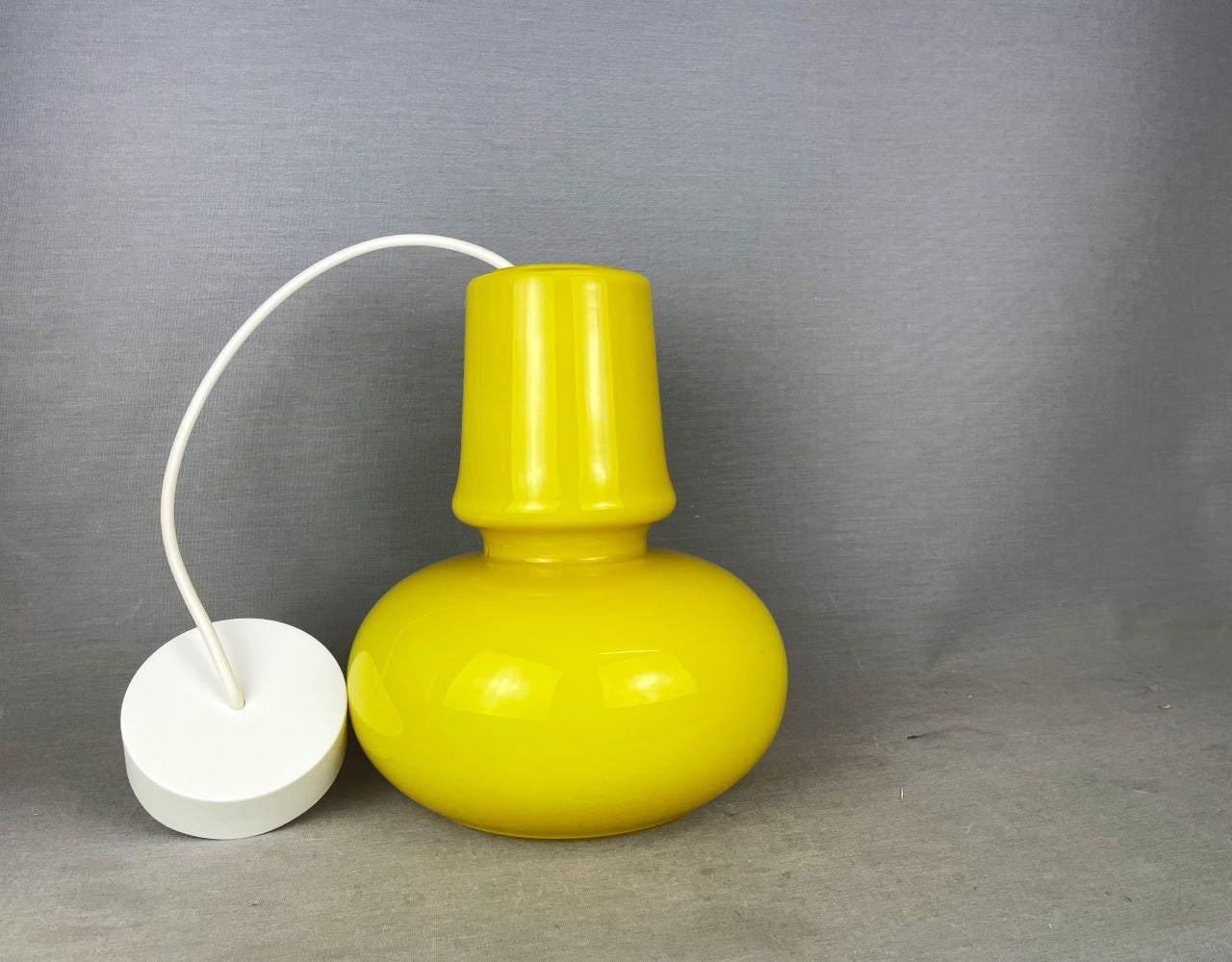 Yellow glass hanging light fixture