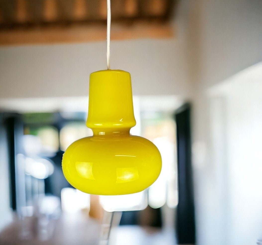 Yellow glass hanging light fixture