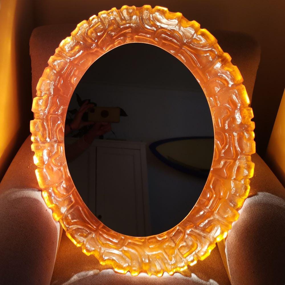 Large Oval backlit wall mirror by Hillebrand
