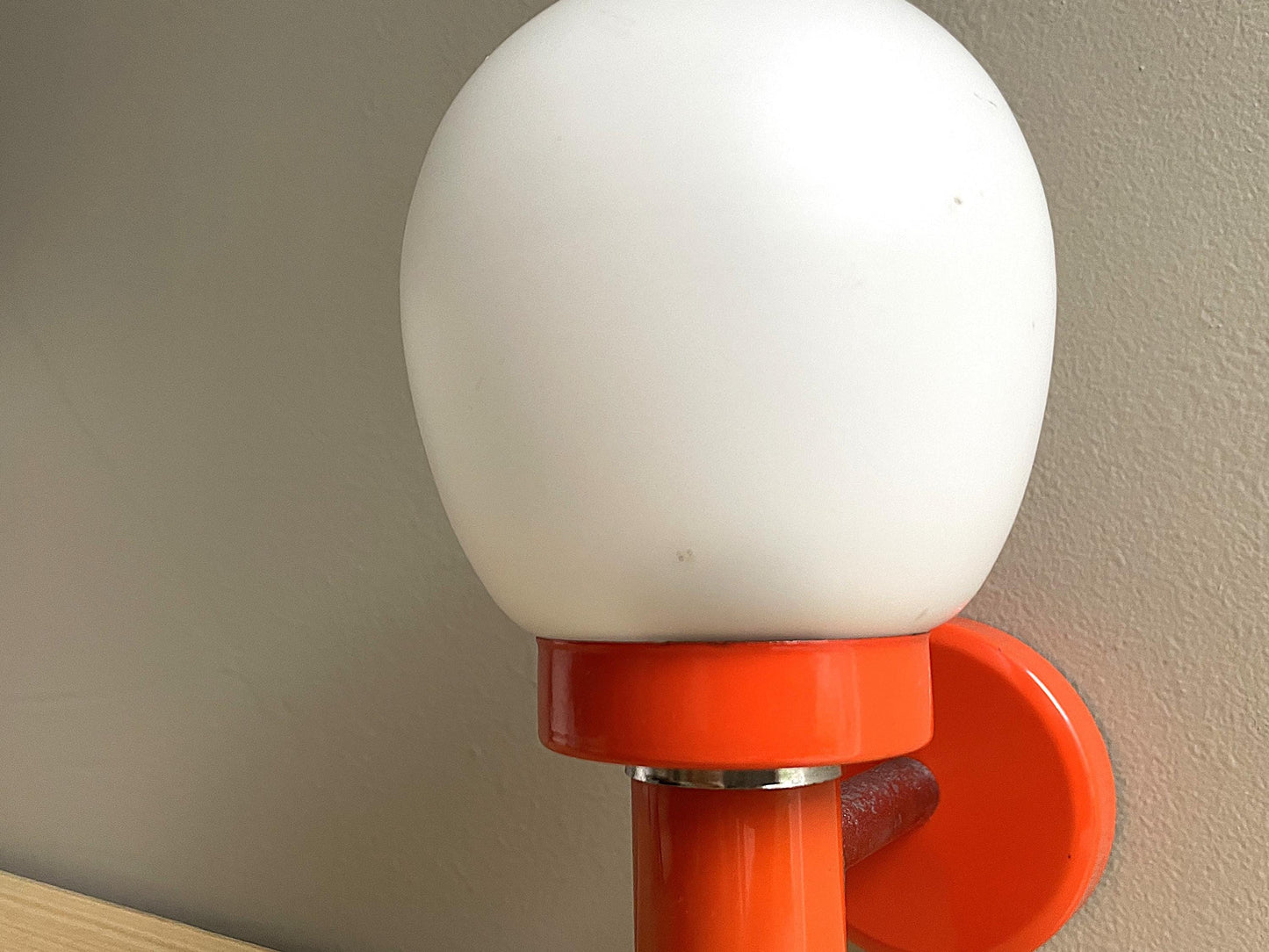Orange wall sconce