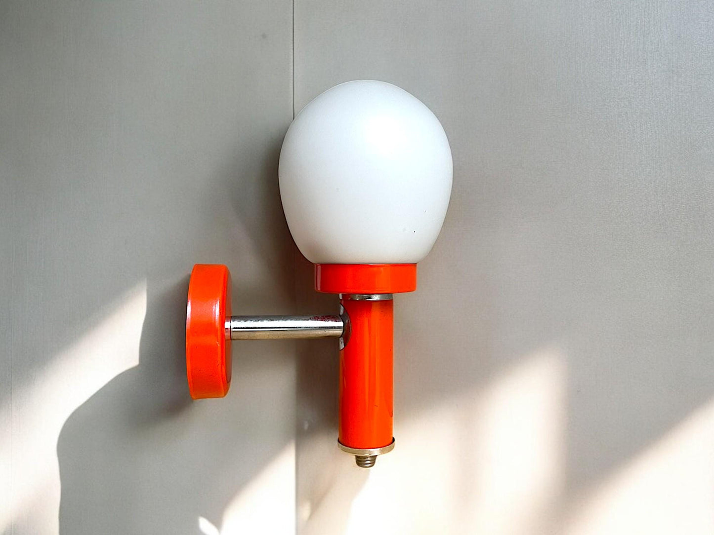Orange wall sconce