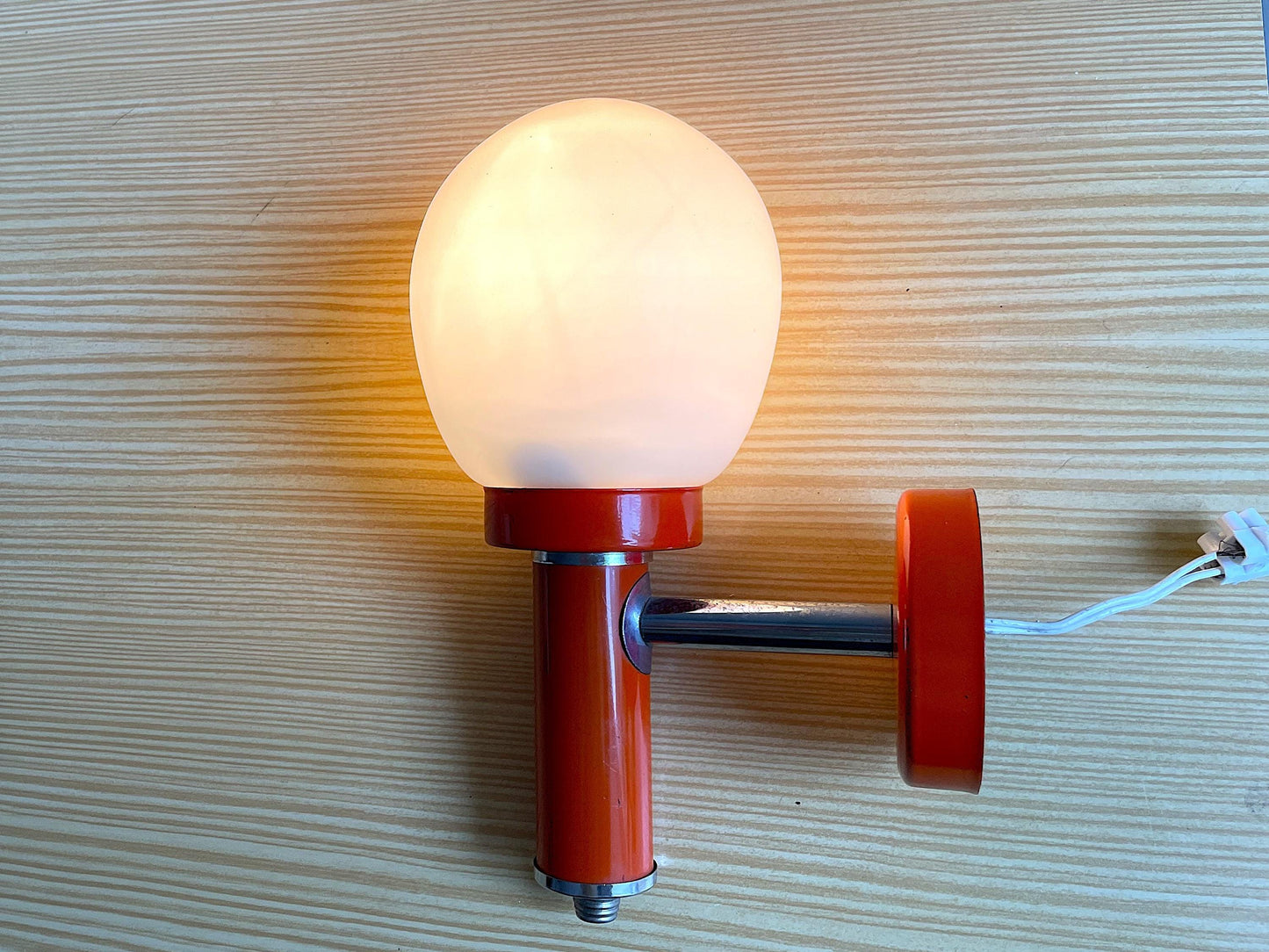 Orange wall sconce