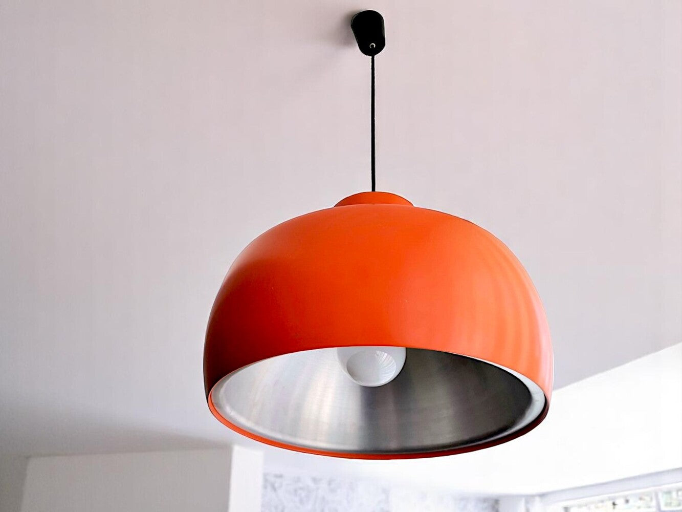 Large orange metal pendant