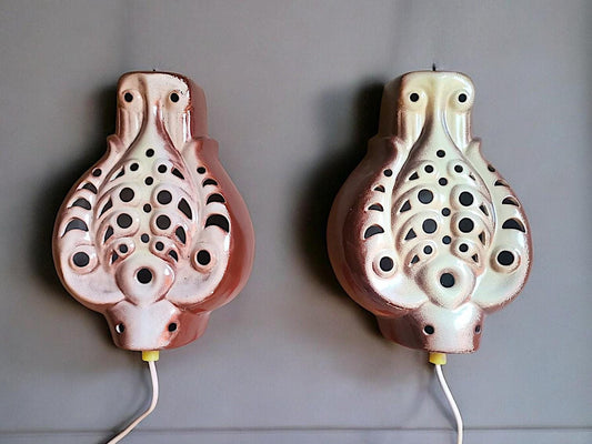 Pair plug in ceramic wall sconces