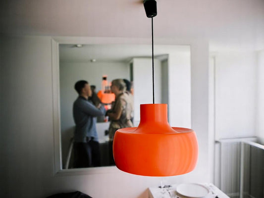 Large orange metal pendant