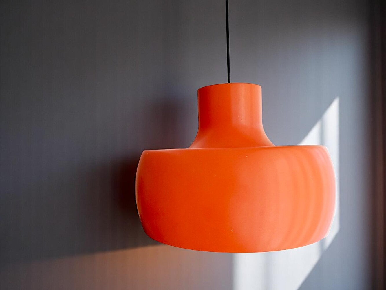 Large orange metal pendant