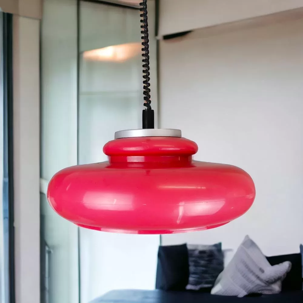 Dark red painted Space Age pendant lamp in dining room